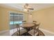 Cozy dining area with a view of the outdoor pool and patio at 755 Taplow Rd, Venice, FL 34293