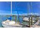 Sailboats docked on a calm waterway, offering beautiful marina views and boating access for residents at 755 Taplow Rd, Venice, FL 34293