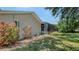 Exterior side view of house featuring screened pool at 755 Taplow Rd, Venice, FL 34293