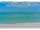 Calm ocean waters under a clear blue sky, providing tranquil beach access for residents at 755 Taplow Rd, Venice, FL 34293