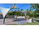 Inviting park with picnic tables, shady canopies, and a serene fountain at 755 Taplow Rd, Venice, FL 34293