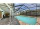 Inviting screened-in pool with patio area, ideal for enjoying the outdoors at 755 Taplow Rd, Venice, FL 34293
