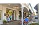 Charming shops with awnings provide a welcoming atmosphere for dining and browsing at 755 Taplow Rd, Venice, FL 34293