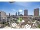 Balcony with seating provides panoramic views of the city skyline on a sunny day at 777 N Ashley Dr # 1712, Tampa, FL 33602
