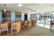 Modern bar area with ample seating, pendant lighting, flat-screen TVs, and an inviting atmosphere at 777 N Ashley Dr # 1712, Tampa, FL 33602
