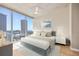 Serene bedroom with a large window offering spectacular city views and ample natural light at 777 N Ashley Dr # 1712, Tampa, FL 33602