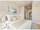 Modern bedroom featuring a queen-size bed, neutral color palette, and a decorative art piece at 777 N Ashley Dr # 1712, Tampa, FL 33602