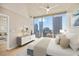 Bedroom with a large window and city views, offering ample space for relaxation and rest at 777 N Ashley Dr # 1712, Tampa, FL 33602