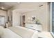 Modern bedroom with concrete ceilings, sleek furniture, and large windows allowing natural light at 777 N Ashley Dr # 1712, Tampa, FL 33602