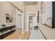 Hallway with mirrored closet, built-in shelves, contemporary decor and hardwood flooring at 777 N Ashley Dr # 1712, Tampa, FL 33602
