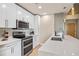 The modern condo kitchen features sleek appliances, and a spacious countertop at 777 N Ashley Dr # 1712, Tampa, FL 33602