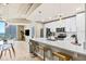 Contemporary kitchen boasts stainless steel appliances, island seating, and an open floor plan at 777 N Ashley Dr # 1712, Tampa, FL 33602