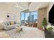 Living room featuring a comfortable seating area and floor-to-ceiling windows with city views at 777 N Ashley Dr # 1712, Tampa, FL 33602