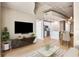 Spacious living room open to a modern kitchen and dining area in this inviting home at 777 N Ashley Dr # 1712, Tampa, FL 33602