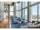 Comfortable lounge area with stylish seating, floor-to-ceiling windows, and views of the city skyline at 777 N Ashley Dr # 1712, Tampa, FL 33602