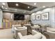 Cozy movie theater with comfortable seating, a large flat-screen TV, and ambient lighting for entertainment at 777 N Ashley Dr # 1712, Tampa, FL 33602