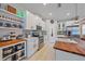 Bright, modern kitchen with wood island, stainless steel appliances, and plenty of storage space at 867 Bacon Ave, Sarasota, FL 34232