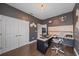 Functional home office with a modern desk setup, ample storage, and a clean, organized workspace at 867 Bacon Ave, Sarasota, FL 34232