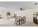 Bright living room with comfortable seating, dining area, and scenic views at 8701 Midnight Pass Rd # 206A, Sarasota, FL 34242