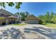 Wide driveway and a detached garage in the backyard at 906 134Th E St, Bradenton, FL 34212