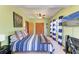Inviting bedroom with neutral carpet and a ceiling fan provides comfortable temperatures at 906 134Th E St, Bradenton, FL 34212