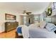 Comfortable main bedroom featuring a large bed, wooden dresser, and plenty of natural light at 906 134Th E St, Bradenton, FL 34212