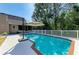 A sparkling in-ground pool, perfect for relaxation and entertaining, set in a well-maintained backyard at 906 134Th E St, Bradenton, FL 34212