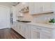 Modern kitchen featuring stainless steel appliances, subway tile backsplash, and quartz countertops at 8752 Coastal Key Way, Parrish, FL 34219