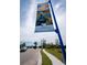 Tideline community sign, showcasing the natural surroundings and community amenities in a serene setting at 1019 Tideline Cv, Bradenton, FL 34209