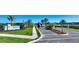 Inviting entrance to the Tideline community with well-maintained landscaping and clear signage at 1019 Tideline Cv, Bradenton, FL 34209