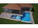 Inviting backyard pool with attached spa and a spacious tile surround, perfect for relaxation and entertaining at 1019 Tideline Cv, Bradenton, FL 34209