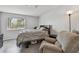 Bright bedroom features a large window, closet, and neutral decor at 10265 Gandy N Blvd # 1004, St Petersburg, FL 33702