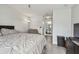 Bright bedroom features a large window, closet, and neutral decor at 10265 Gandy N Blvd # 1004, St Petersburg, FL 33702