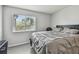 Bright bedroom features a large window, closet, and neutral decor at 10265 Gandy N Blvd # 1004, St Petersburg, FL 33702