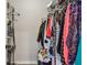 Walk-in closet with metal shelving and hanging rods, providing organized storage space for clothing and accessories at 10265 Gandy N Blvd # 1004, St Petersburg, FL 33702