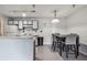 Functional kitchen with essential appliances, providing an efficient cooking space near dining area for easy meals at 10265 Gandy N Blvd # 1004, St Petersburg, FL 33702