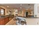 Community kitchen with stainless steel appliances, dark countertops, breakfast bar, and neutral colors at 10265 Gandy N Blvd # 1004, St Petersburg, FL 33702