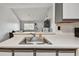 Efficient kitchen sink area that overlooks a vaulted great room at 10265 Gandy N Blvd # 1004, St Petersburg, FL 33702