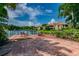 Community patio overlooks the lake and has seating for residents to enjoy the tranquil setting at 10265 Gandy N Blvd # 1004, St Petersburg, FL 33702