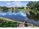 Scenic pond view with lush green surroundings at 10265 Gandy N Blvd # 1004, St Petersburg, FL 33702