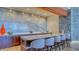 Wet bar features sleek countertops, stylish seating, and a sophisticated design at 1211 Gulf Of Mexico Dr # 704, Longboat Key, FL 34228