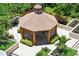 Charming gazebo with seating area, perfect for outdoor relaxation at 1211 Gulf Of Mexico Dr # 704, Longboat Key, FL 34228