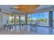 The lounge features a stunning view of the beach, along with modern furniture and elegant design at 1211 Gulf Of Mexico Dr # 704, Longboat Key, FL 34228