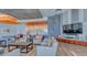 Comfortable lounge area with modern decor, a bar, and a relaxing atmosphere at 1211 Gulf Of Mexico Dr # 704, Longboat Key, FL 34228