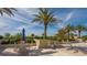 Outdoor patio offering comfortable seating, lush landscaping, and a relaxing ambiance at 1211 Gulf Of Mexico Dr # 704, Longboat Key, FL 34228