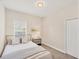 Inviting bedroom featuring a calming color scheme, soft lighting, and ample closet space at 12710 Coastal Breeze Way, Bradenton, FL 34211