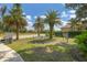 Hammock park shaded by palm trees and lush landscaping at 12710 Coastal Breeze Way, Bradenton, FL 34211