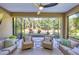 Relaxing screened lanai with comfortable seating, perfect for enjoying the outdoors in comfort at 12710 Coastal Breeze Way, Bradenton, FL 34211