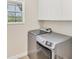 Laundry room featuring modern washer and dryer at 12710 Coastal Breeze Way, Bradenton, FL 34211