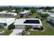 Charming home showcases solar panels, pristine tile roof, and well-manicured landscaping in a tranquil neighborhood at 1315 Bottlebrush Dr, Bradenton, FL 34208